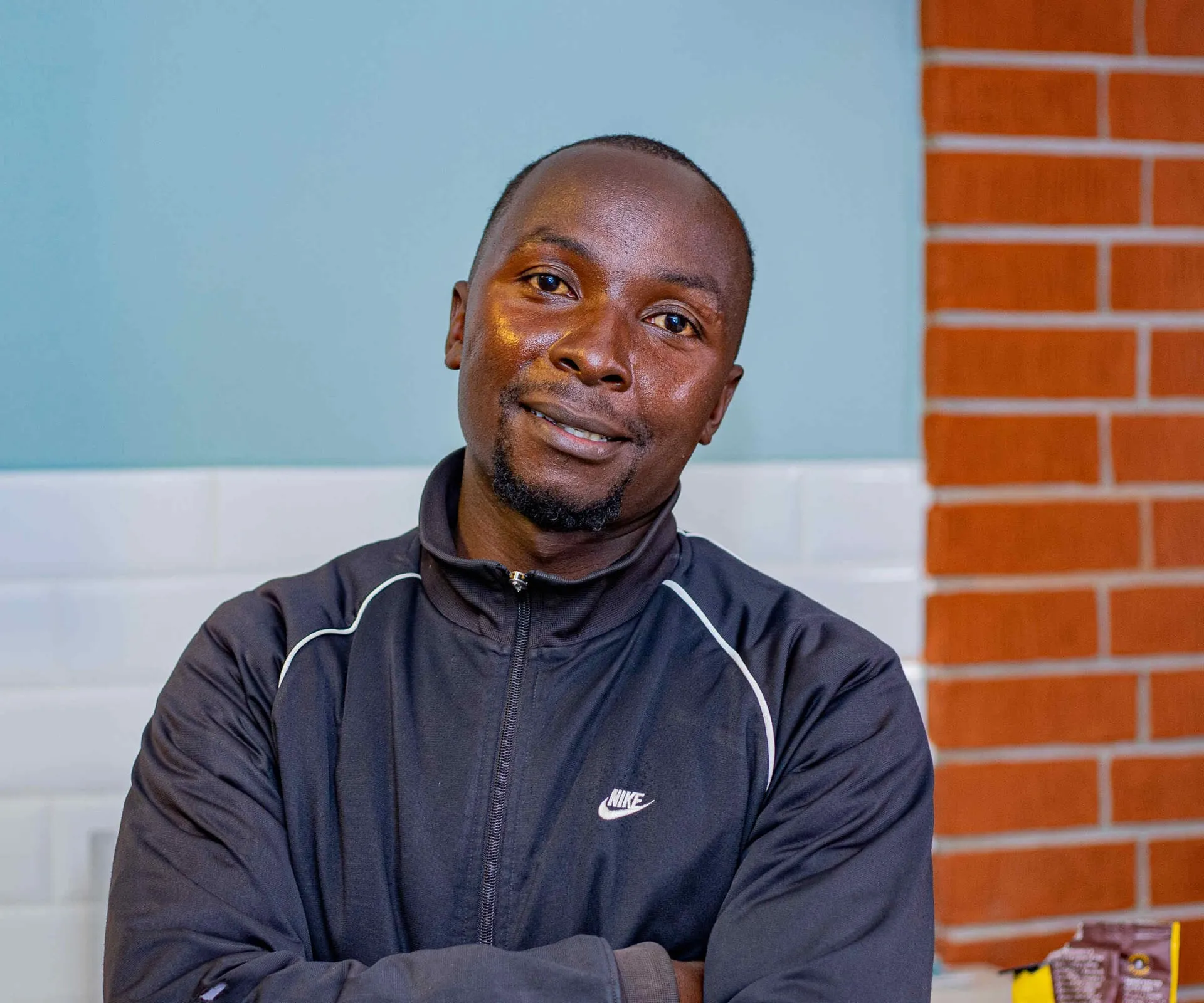 Paul, a shop owner in Nairobi who uses Leja